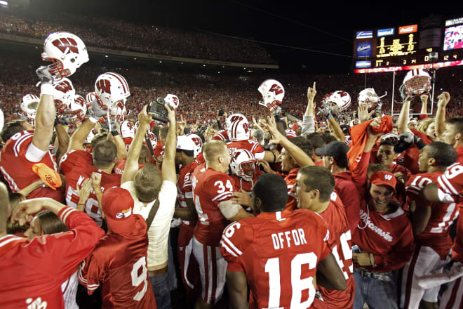 Wisconsin celebrates the team's 31-18 upset over Ohio State in an NCAA football college game Saturday, Oct. 16, 2010.