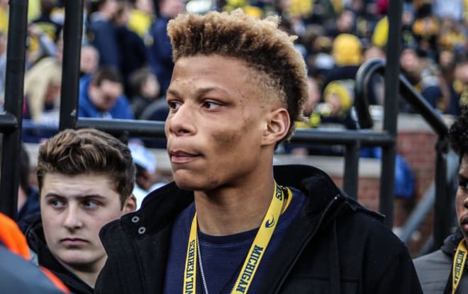 Three-star safety J'Marick Woods sticks with Michigan after giving Arkansas and Mississippi State a chance to flip him.