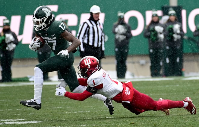 Michigan State wide receiver Tre Mosley runs through a tackle versus Indiana on Nov. 19, 2022