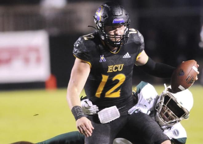 Holton Ahlers runs for positive yardage in Thursday night's East Carolina win over South Florida.