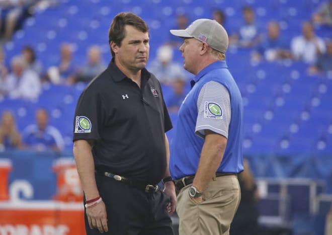 Will Muschamp and Mark Stoops (USA TODAY Sports)