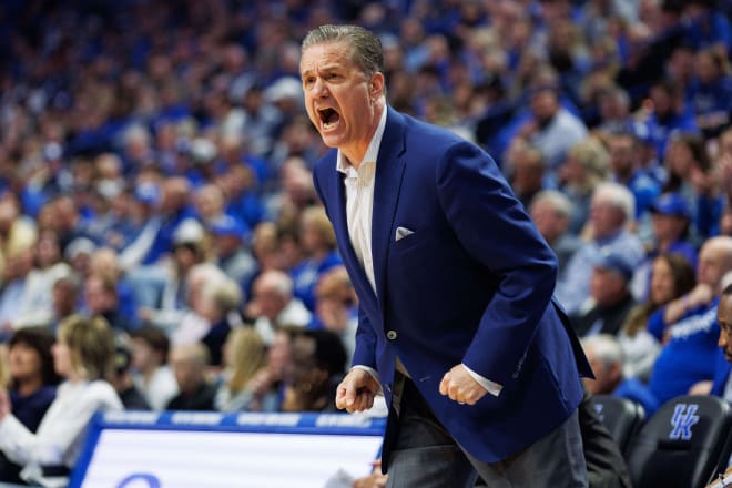 John Calipari yells to his players during the first half against the Vanderbilt Commodores 