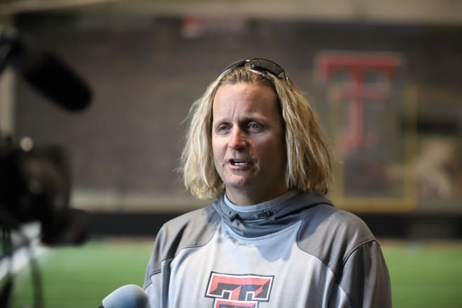Offensive coordinator David Yost talks to the media inside the indoor practice facility Monday afternoon.