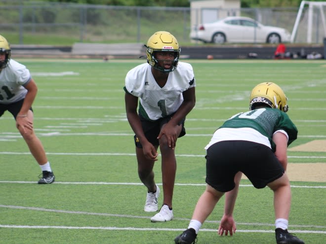 Julian Manson lines up on the edge for Iowa City West.