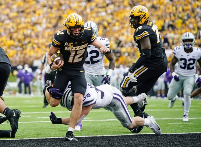 Mizzou QB Cook 'day to day' with right knee injury