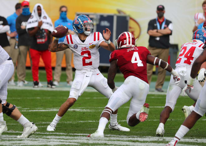 Ole Miss Rebels quarterback Matt Corral (2) throws he ball as Indiana Hoosiers linebacker Cam Jones (4) rushes during the second half at Raymond James Stadium. Mandatory Credit: Kim Klement-USA TODAY 