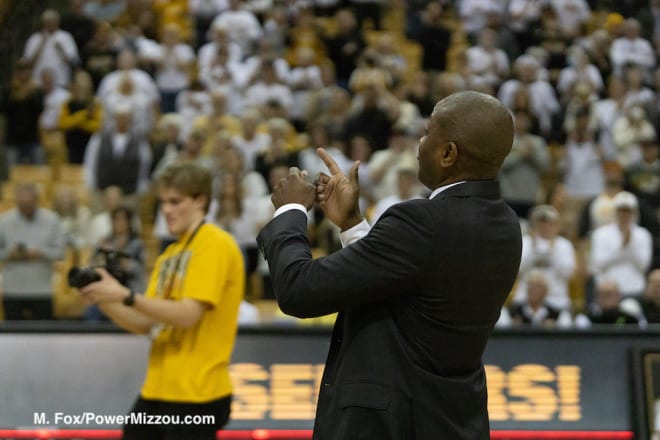 Dennis Gates celebrates another win before senior day ceremonies