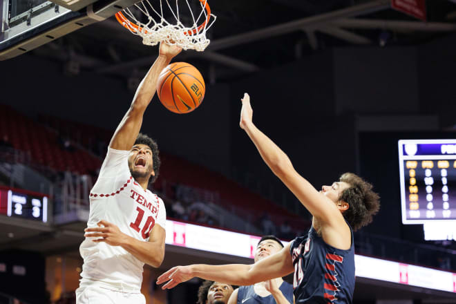 Jake Forrester dunks home two of his season-high 21 points Saturday. 