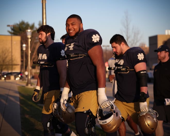Notre Dame offensive tackle Blake Fisher and his O-linemates head to spring practice.