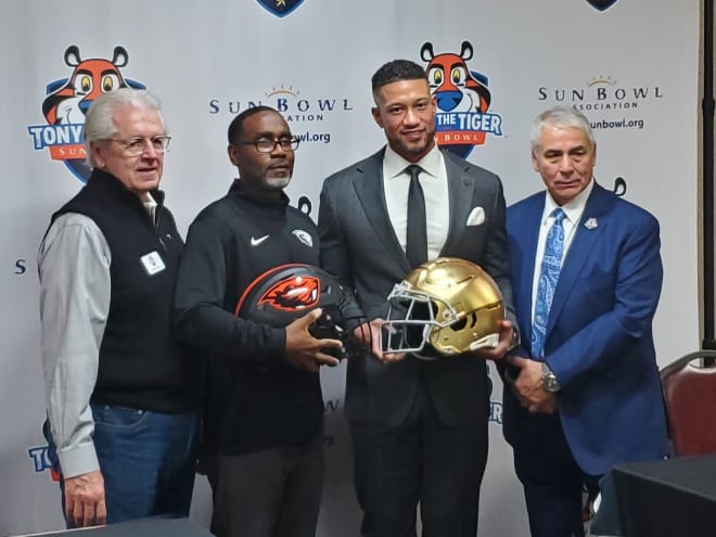 From left to right: Sun Bowl football charirman John Fulmer, Oregon State interim head coach Kefense Hynson, Notre Dame head coach Marcus Freeman and Sun Bowl executive director Bernie Olivas, pose after Thursday's press conference in El Paso, Texas.