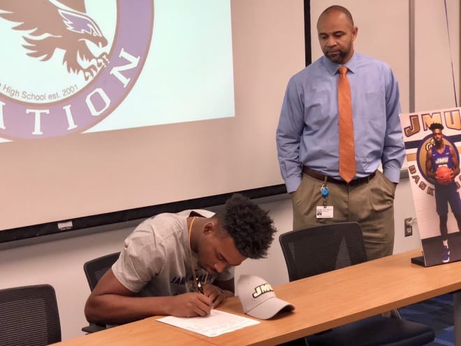 Virginia High School League Class 6 Player of the Year Michael Christmas signed his letter of intent with JMU last fall, choosing the Dukes over Old Dominion. 