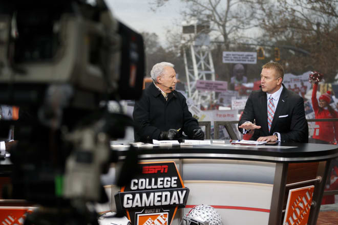 Kirk Herbstreit, right, will be doing double duty Saturday in Columbus, Ohio — as part of ESPN's College GameDay in the morning and calling the game for ABC Saturday night.