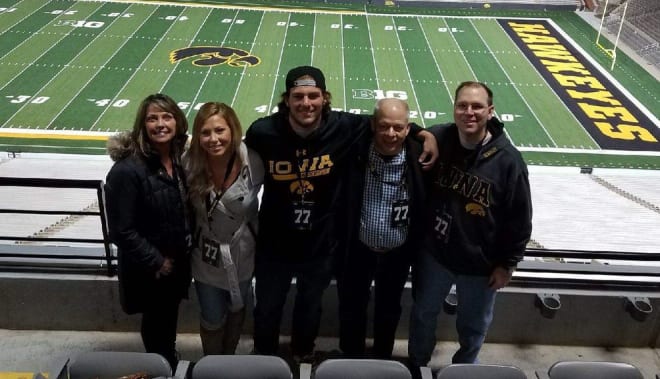 Offensive lineman Jeff Jenkins and family on his official visit to Iowa in December.