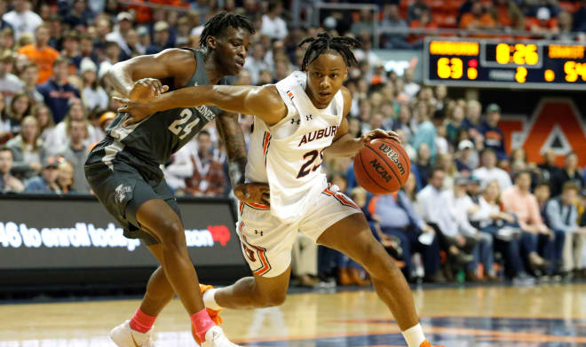 Okoro (23) led Auburn down the stretch with 11 of its final 13 points.