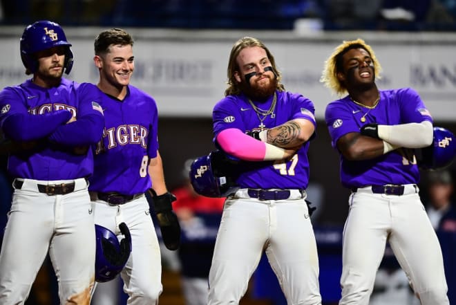 LSU's Dylan Crews, Gavin Dugas, Tommy White and Tre' Morgan strike a pose after White's fifth-inning grand slam homer gave the Tigers the lead in an eventual 7-3 win at Ole Miss Friday night.