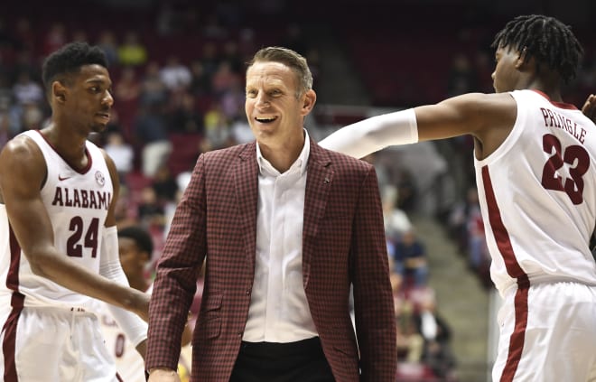 Alabama head coach Nate Oats talks to an official about a non call at Coleman Coliseum. Alabama won 78-65.  Photo | Gary Cosby Jr.-USA TODAY Sports