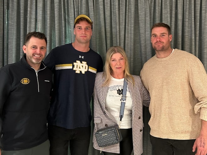 Notre Dame special teams coordinator Marty Biagi, left, landed a commitment from Australian punter James Rendell, second from left, on Wednesday.