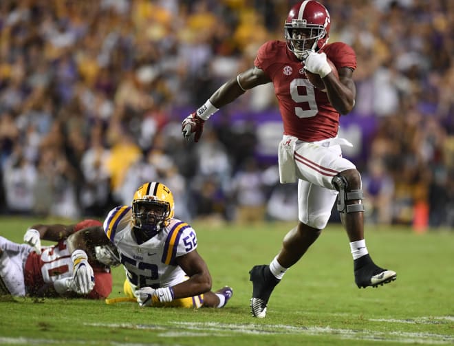 Alabama Crimson Tide running back Bo Scarbrough (9) scrambles up the field against the LSU Tigers during the third quarter at Tiger Stadium. Alabama defeated LSU 10-0. Photo | USA Today
