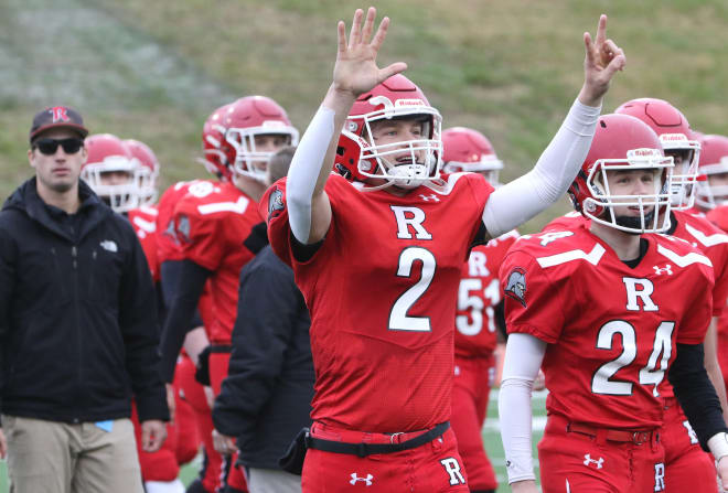 Riverheads QB Bennett Dunlap holds up seven fingers, signaling that the Gladiators have won seven consecutive State Championships - a VHSL record as the program gets ready to move up to the Class 2 level for 2023