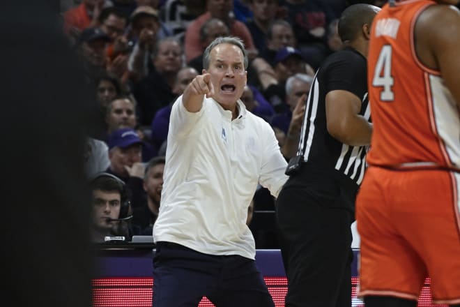 An animated Chris Collins pleads his case to the referees during his team's 96-91 overtime win over Illinois.