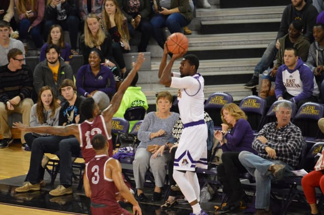 ECU's Caleb White launches in three of his game high twenty points in a 69-56 win over NC Central.
