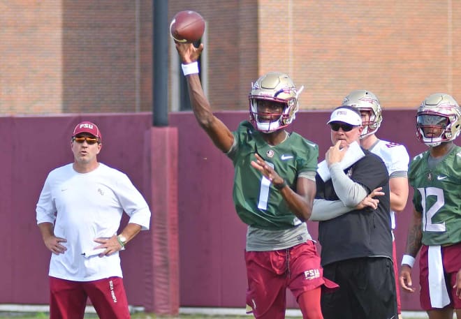 Florida State coach Jimbo Fisher and quarterbacks coach Randy Sanders observe Blackman at a recent practice.