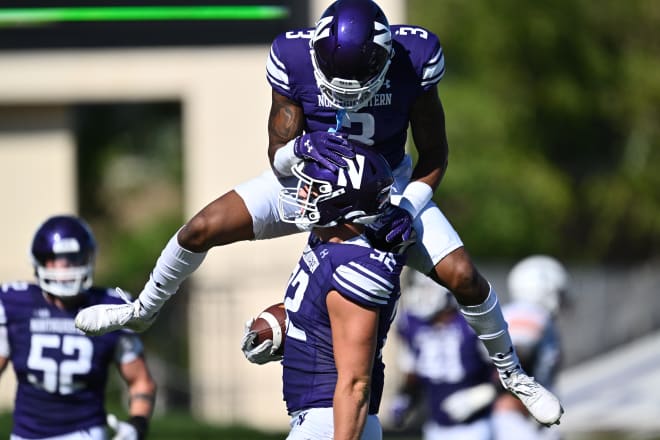 Sep 9, 2023; Evanston, Illinois, USA; Northwestern Wildcats defensive back Jaheem Joseph (3) celebrates with linebacker Bryce Gallagher (32) after Gallagher intercepted a pass in the first half against the University of Texas El Paso Miners at Ryan Field. Mandatory Credit: Jamie Sabau-USA TODAY Sports