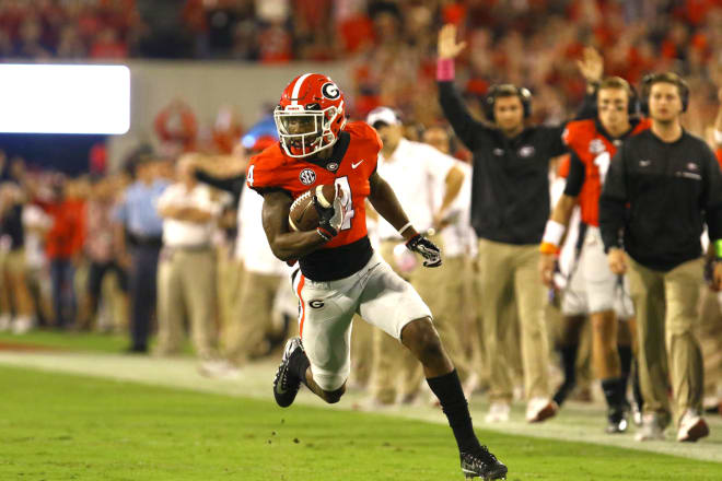 Ready for takeoff: Former Georgia star Mecole Hardman arrives at