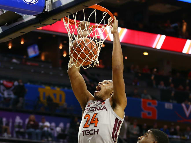 Kerry Blackshear Jr. dunks the ball against the Miami Hurricanes in the ACC conference tournament at Spectrum Center. 