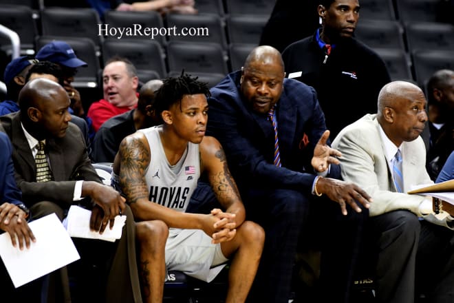 Ewing, teaching James Akinjo. 