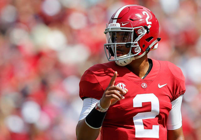 Where did Jalen Hurts play high school and college football?