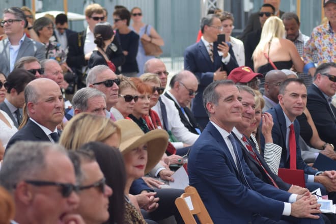 USC football coach Clay Helton, second row left, and Los Angeles Mayor Eric Garcetti, front right.