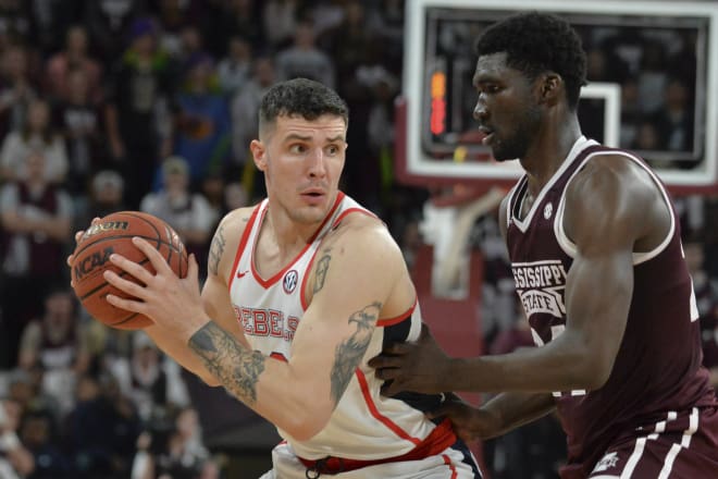 Dominik Olejniczak, shown here working against Mississippi State's Abdul Ado in the Rebels' win in Starkville last month, has been much improved for the Rebels this season.