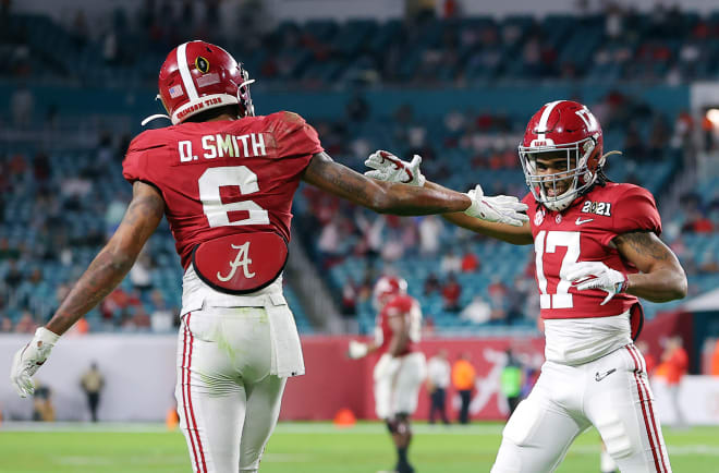 Alabama wide receivers DeVonta Smith, left, and Jaylen Waddle celebrate during the national championship game against Ohio State. Photo | Getty Images 