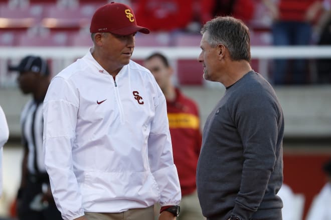 USC coach Clay Helton and Utah coach Kyle Whittingham before the teams' 2018 clash in Salt Lake CIty, which the Utes won 41-28.