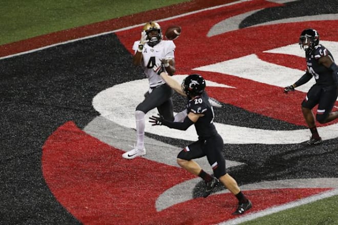 UCF wide receiver Tre'Quan Smith catches a touchdown against Cincinnati in 2017 during the Knights' route of the Bearcats. It was a defeat that helped signal to the Bearcats that big changes were needed.