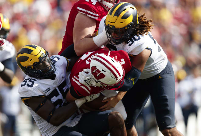 The Michigan Wolverines football defense shut down the Badgers, aided by 2.5 sacks from defensive end David Ojabo