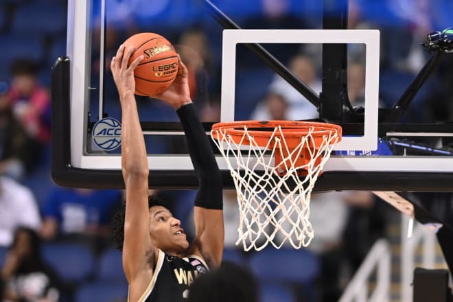 Bobi Klintman dunks against Syracuse during the ACC tournament. 