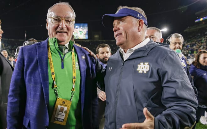 (From L to R): Notre Dame athletics director Jack Swarbrick and head football coach Brian Kelly.