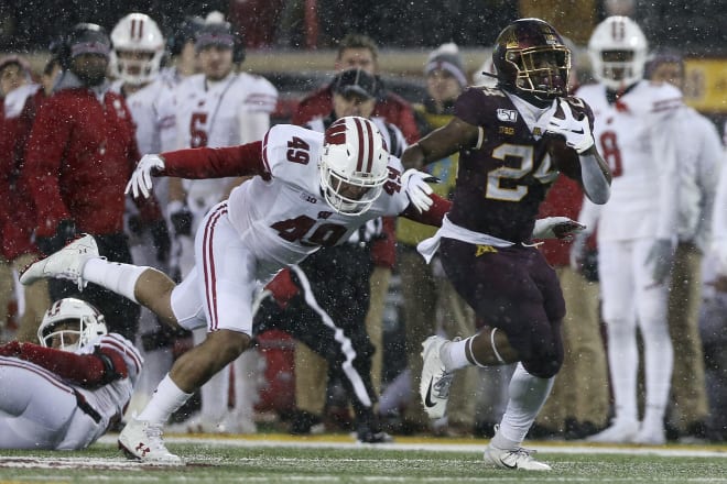 Minnesota Golden Gophers running back Mohamed Ibrahim runs down the field