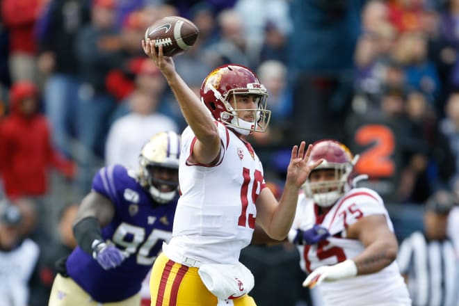 USC quarterback Matt Fink threw 3 costly interceptions in the Trojans' tumble at Washington.