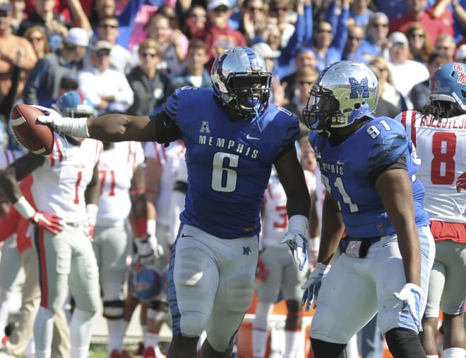 Memphis linebacker Genard Avery celebrates a big play during the Tigers' 37-24 win over Ole Miss last October. Avery, a Grenada, Miss., product, said Monday he's hoping to transfer to Ole Miss.