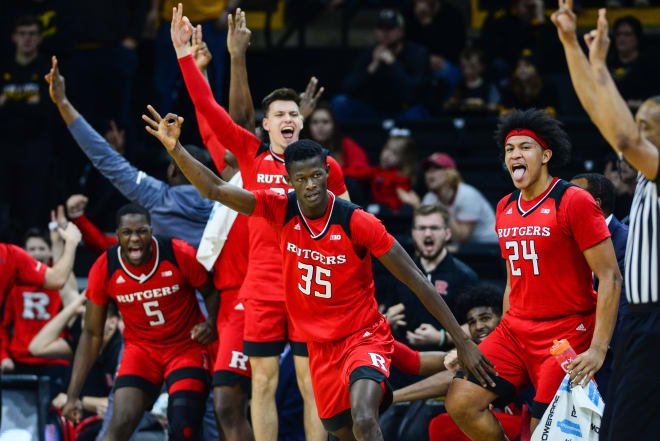 Mar 2, 2019; Iowa City, IA, USA; Rutgers Scarlet Knights forward Issa Thiam (35) and the Scarlet Knights bench react after a three point basket by Thiam during the second half against the Iowa Hawkeyes at Carver-Hawkeye Arena. Mandatory Credit: Jeffrey Becker-USA TODAY Sports