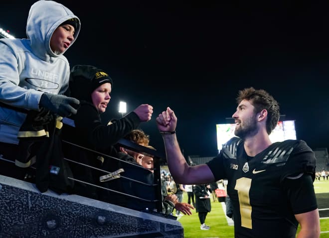 Nov 11, 2023; West Lafayette, Indiana, USA; Purdue Boilermakers quarterback Hudson Card (1) celebrates with fans after defeating the Minnesota Golden Gophers at Ross-Ade Stadium. Mandatory Credit: Robert Goddin-USA TODAY Sports