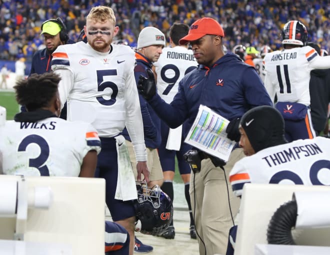 UVa announced this week that WRs coach Marques Hagans will remain on staff under new football coach Tony Elliott.