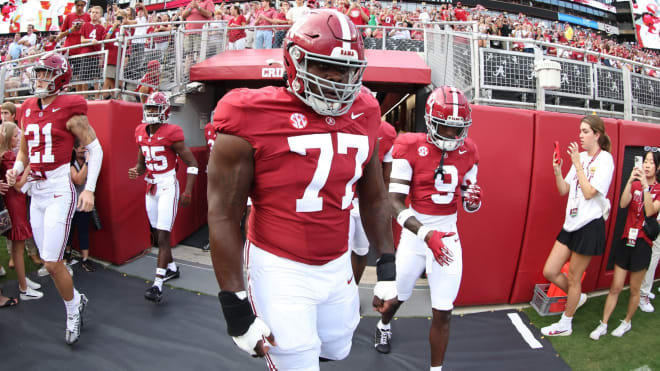 Alabama offensive lineman Jaeden Roberts walks out of the tunnel. Photo | Alabama Athletics 