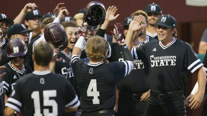 Mississippi State players celebrate a big moment in the Tallahassee Regional.