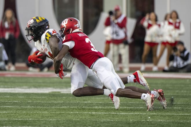 Oct 15, 2022; Bloomington, Indiana, USA; Maryland Terrapins running back Roman Hemby (24) is tackled by Indiana Hoosiers defensive back Tiawan Mullen (3) during the second half at Memorial Stadium.