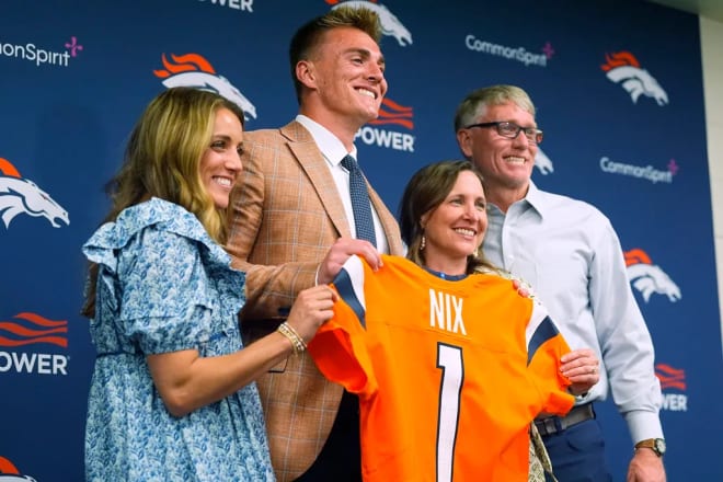 Nix with his wife and parents at the Broncos' introductory press conference.
