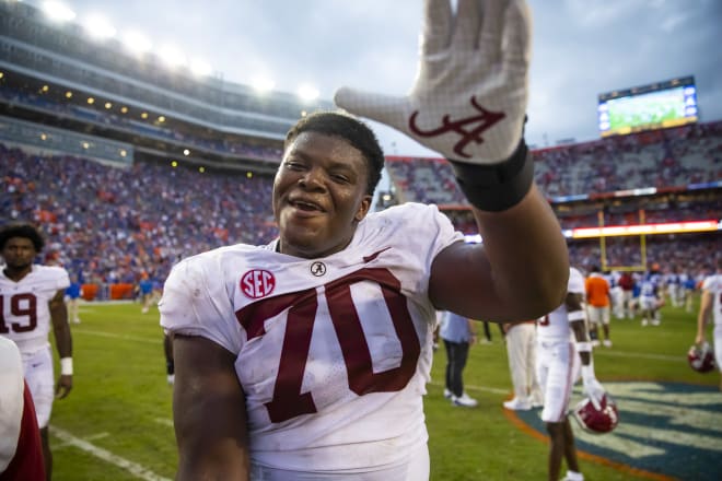 Alabama Crimson Tide offensive lineman Javion Cohen (70) celebrates after defeating the Florida Gators at Ben Hill Griffin Stadium. Photo | Mark J. Rebilas-USA TODAY Sports